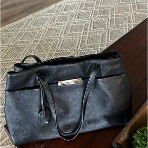 Kate Spade black pebbled leather handbag great used condition w/gold bar accent